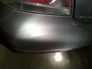 someone busted up my rear driver side lip and scuffed up my bumper...-img-20130403-00146.jpg