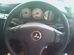 How many here own an EVO 7?-steering-shift-dials.jpg
