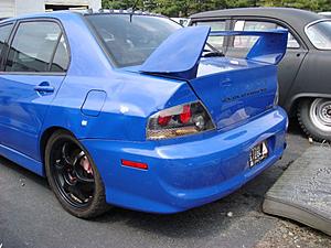 Evo Comming Back-rear-dent.jpg
