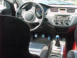 Classy shifter knobs that don't raise height?-evo17july2003.jpg