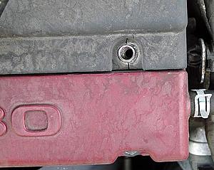 Carbign Craft Spark Plug Cover fitment-spark-plug-cover-stock-front-left-screw.jpg