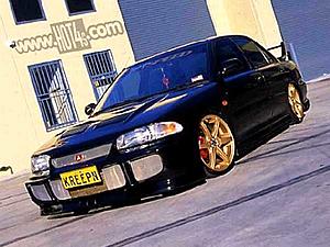 Anyone have BLACK evo with GOLD rims-aab.jpg