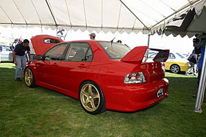 Poll for Rims on a Rally Red-red-w-bronze-rims.jpg