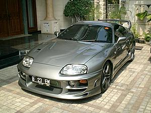 evo vs supra?-side.jpg