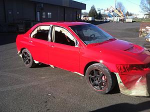 Evo backed into =(-img_4273.jpg