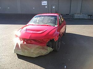 Evo backed into =(-img_4274.jpg