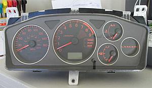2x Evo Ix Gauge clusters, oem steering wheel/airbag-cluster.jpg
