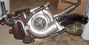 Garage Clean-up (stock and aftermarket parts)!!-evo8_turbo_assembly_02.jpg